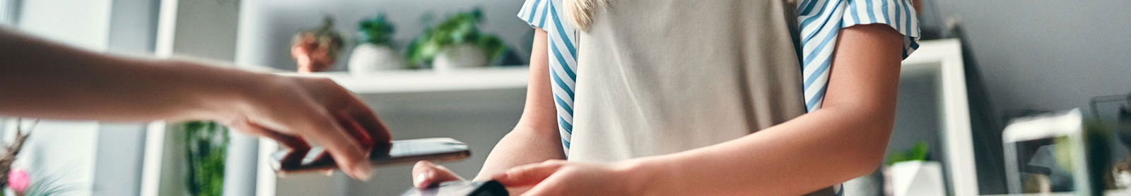 Close up of customer making a purchase with phone