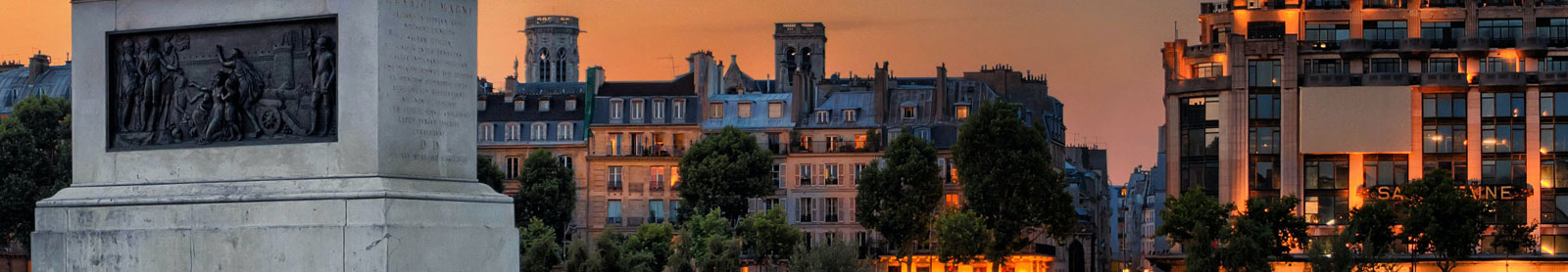 Photo of European city at dusk