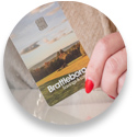 Close up photo of hand holding a Brattleboro Savings & Loan debit card