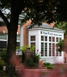 Close up exterior photo of Park Place Financial Advisors showing large bay window